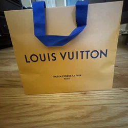 LOUIS VUITTON Authentic Paper Gift Shopping Bag Tote Orange 10” X 8 X 6”.