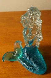 Nautical Beach. Made of clear acrylic with teal accent color.