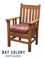 The chair has a very comfortable large spring seat with a newer piece of thick reddish brown colored leather. The chair...