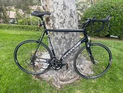 Cannondale road bike with 63 cm frame.  Lightly worn and seldom used.