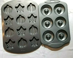 Norpro 6 Donuts Mold. Wilton Baking Pumpkin & Leaves Mold. Very good condition. my opinion. My opinion. What you see is...