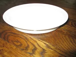 Small oval serving or baking dish by CRATE & BARREL in white.