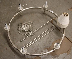 6 Light cathedral style ceiling fixture. Dry locations only, requires incandescent candelabra bulbs. Kill A Watt...