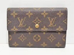 Portefeuille INTERNATIONAL Louis Vuitton, en toile enduite monogram. Composition : toile enduite monogram. Coloris :...
