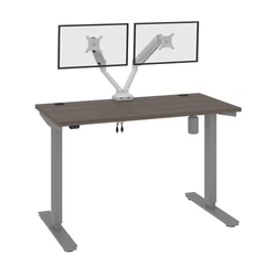 With its minimalist design, this modern Standing Desk will blend in with any decor. The Dual Monitor Arm frees up your...