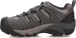 Water-resistant leather and fabric upper with rubber toe guard and steel toe for added protection. Rubber sole.