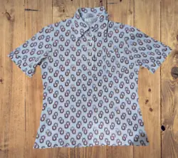 This 100% cotton top is in remarkable condition considering it is about 50 years old and the all-over pattern is on a...