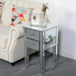 This unique mirrored nightstand or bedside table with two drawers is sure to add sparkle to your bedroom. The Mirrored...