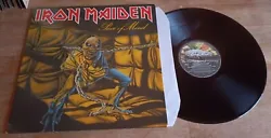 Iron Maiden – Piece Of Mind. SLEEVE (pochette) NM / RECORD (disque) EX. Good The record displays considerable surface...