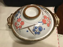 Ceramic baking dish with lid, painted flower design. Condition is 