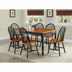 It includes a table and six chairs. The solid-wood dining chairs have an elegant, traditional look, which is inspired...
