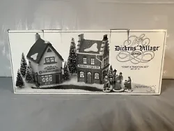 Add a touch of tradition to your Christmas decor with this beautiful ceramic and porcelain Department 56 Dickens...