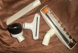 CREVICE TOOL-USED BUT GOOD CONDITION. DUSTING BRUSH-UNUSED. SMALL VAC NOZZLE TOOL-UNUSED.