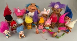 Vintage 20 Assortment of preowned and loved troll dolls vary in size from 1 inch-8 inches (not including hair).  Some...
