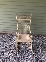 Wonderful addition to your farmhouse decor! Wicker decoration on the back. The back and sides are fashioned with turned...