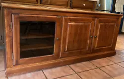 Its a beautiful, high-quality piece. Originally had a large top piece with cabinets for old-style TV, so current top is...
