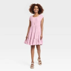 •Short-sleeve A-line dress •Crafted from soft, stretchy fabric •Round neckline •Double-stitched seam •Mini...