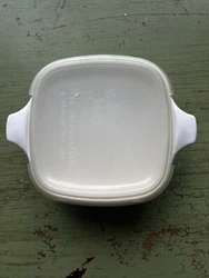 Lid has scratches and tape wear. Very Good Condition.
