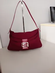 Fendi Vintage Mamma Baguette Nylon Shoulder Bag. The bag is pre-owned and has some stains on the inside and outside of...