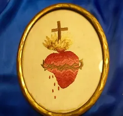 This is a very beautiful antique embroidered Sacred Heart of Jesus picture. Condition is excellent with partial nails...