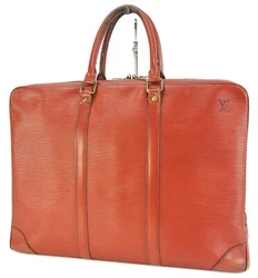 Epi leather. Epi leather has discoloration, wear, spot, stain, scuffing, rubbing and wrinkles. 1 large inside zippered...