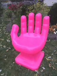 For sale is a NEW GIANT left Hand Shaped Chair. It is solid NEON PINK in color. The plastic is solid colored all the...