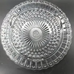 Mid Century Modern. Three Footed. Reverse Etched Sunflower Design. Etched Bubbles Surrounds the Sunflower Design....