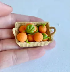 Veggie for 1:12 dollhouse. Primary material: vegetable &fruit: Clay -(hand paint ). Basket: resin. The fruit is not...