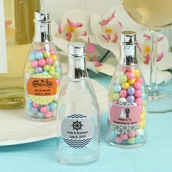 Clear plastic champagne bottle-shaped container. Bottles top is shiny silver plated to resemble champagnes foil-wrapped...