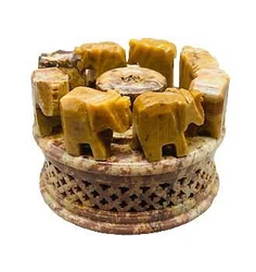 A parade of Elephants travel all around the lid that sits on top of the detailed base. From India.