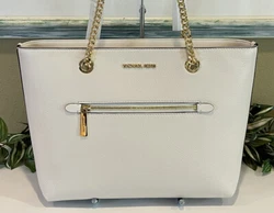 Gorgeous Leather in Light Cream. Purse Features Ill be happy to clarify any information presented. Interior is lined in...