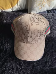 Brown Gucci Hat.