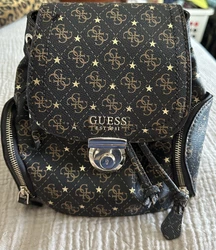 guess mini backpack. Used Once.. Condition is Pre-owned. Shipped with USPS Priority Mail.