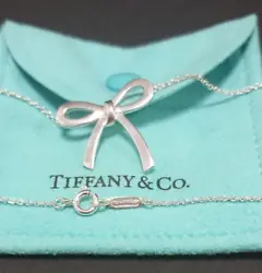 TIFFANY & Co. Bow Mini Ribbon Sterling Silver Charm Pendant Necklace SV925. Material → 925 Sterling silver. Total...