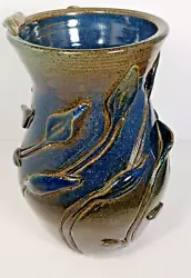 Stoneware very nice vase color blue and brown this vase is beautiful vase.