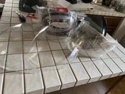 Motorcycle Helmet Face Shield. 3 clear, one dark , one semi gray. Two clear are new along with semi clear. One dark and...