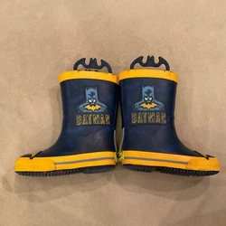 Western Chief rain boots 7/8 boys batman handles. Good used condition with what looks like playdough in the soles