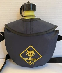 Official Cub Scouts, Blue & Yellow Canteen with canvas cover & adjustable shoulder strap. I believe this has a 1 quart...