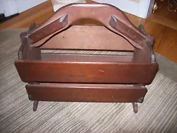 This is a very early magazine rack dont know the exact date but it is believed to be in the early 1900s. It is in...