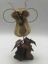 Metal Brutalist Owl Sculpture on Wood Base With Maple Leaves Glass Eyes.