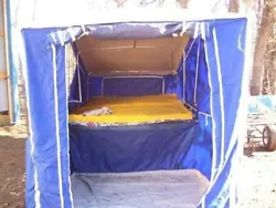 Aspen camper with king size bed 5x6 changing area.. plenty of storage underneath also a cooler rack on front