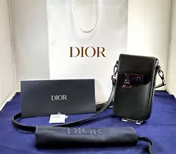 Up for sale is a Christian Dior Smooth Calfskin Verticle Pouch Lock Bag with the original dust bag. This bag is used,...
