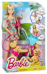 Girls can attach Barbie doll’s hands to the stroller and push along. For added realism, the small puppy’s head bobs...