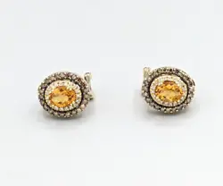 8x6mm Citrine center. 14K Yellow Gold. Graded as mounting permits. All gemstone grading and weight estimation is done...