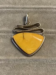 Vintage sterling amber faux amber egg yolk necklace pendant. This is a preowned item and may show normal signs of use...