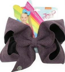 Large Jojo Siwa Bow. Bow fastens with an alligator clip.
