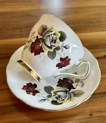 CROWN PRINCE ENGLAND Teacup & Saucer Blue Rose & Dark Red Clematis Gold TrimBeautiful set in unused condition Cup:...