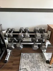 Like new (grips/cleanliness) set of metal dumbbells, never been stored outside, some chips in the coating on one or two...