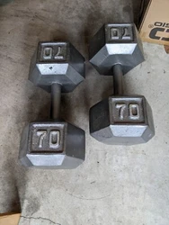 PAIR OF 70LB IRON DUMBELLS. LOCAL PICKUP ONLY