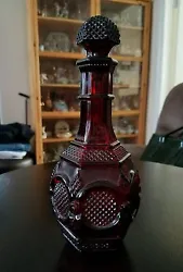 Very elegant looking vintage ruby red decanter By Avon , still in excellent condition I have more decanters and many...
